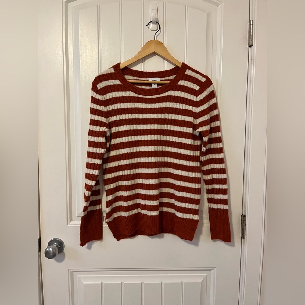Orange-striped pullover